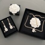 Chanel Perfume Bottle Stud Earrings - Image 2