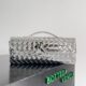 BOTTECA VENETA uses exquisite craftsmanship intreccio weaving imported lacquered cowhide leather eve